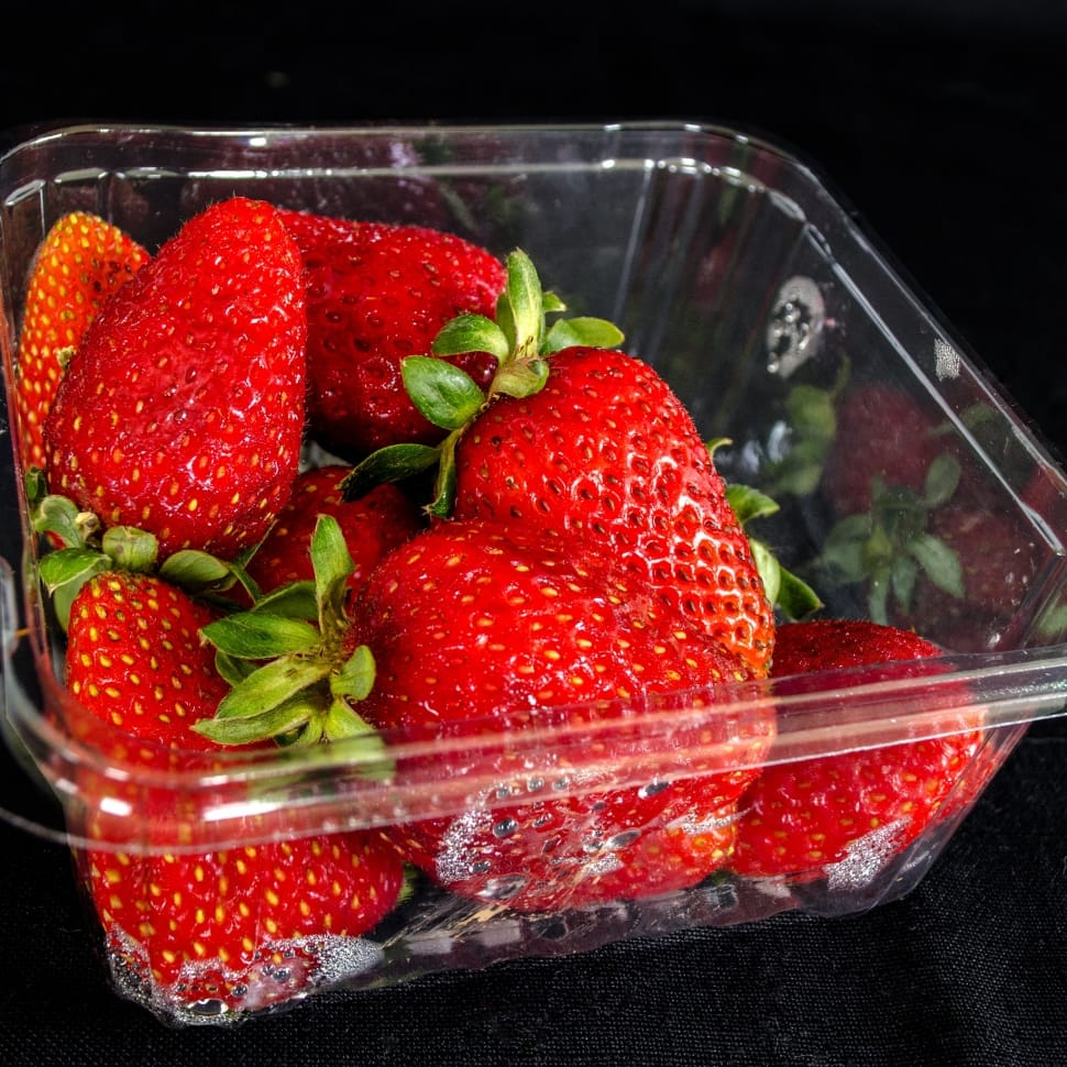 strawberries in plastic container preview