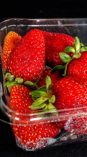 strawberries in plastic container thumbnail