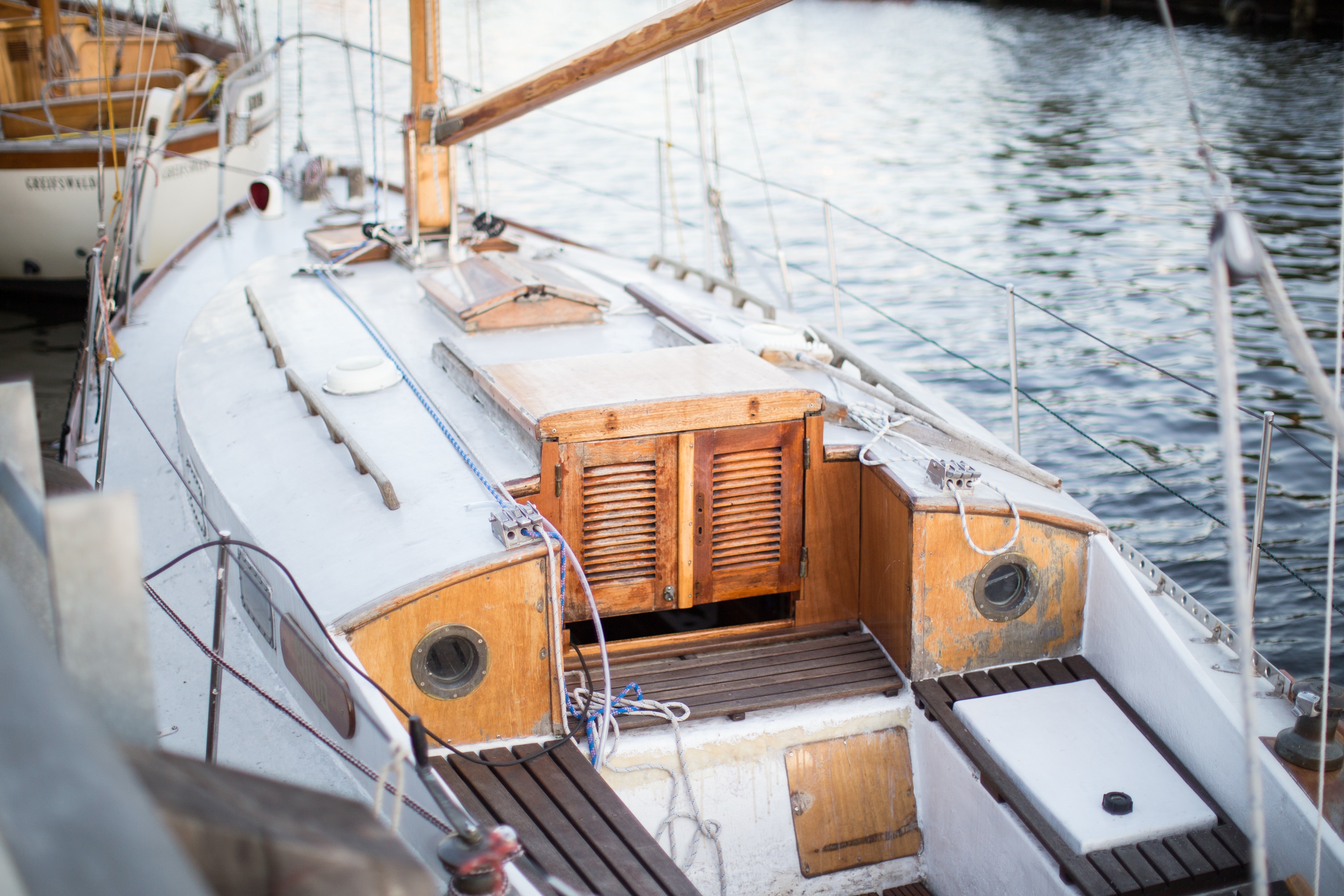 white and brown yacht