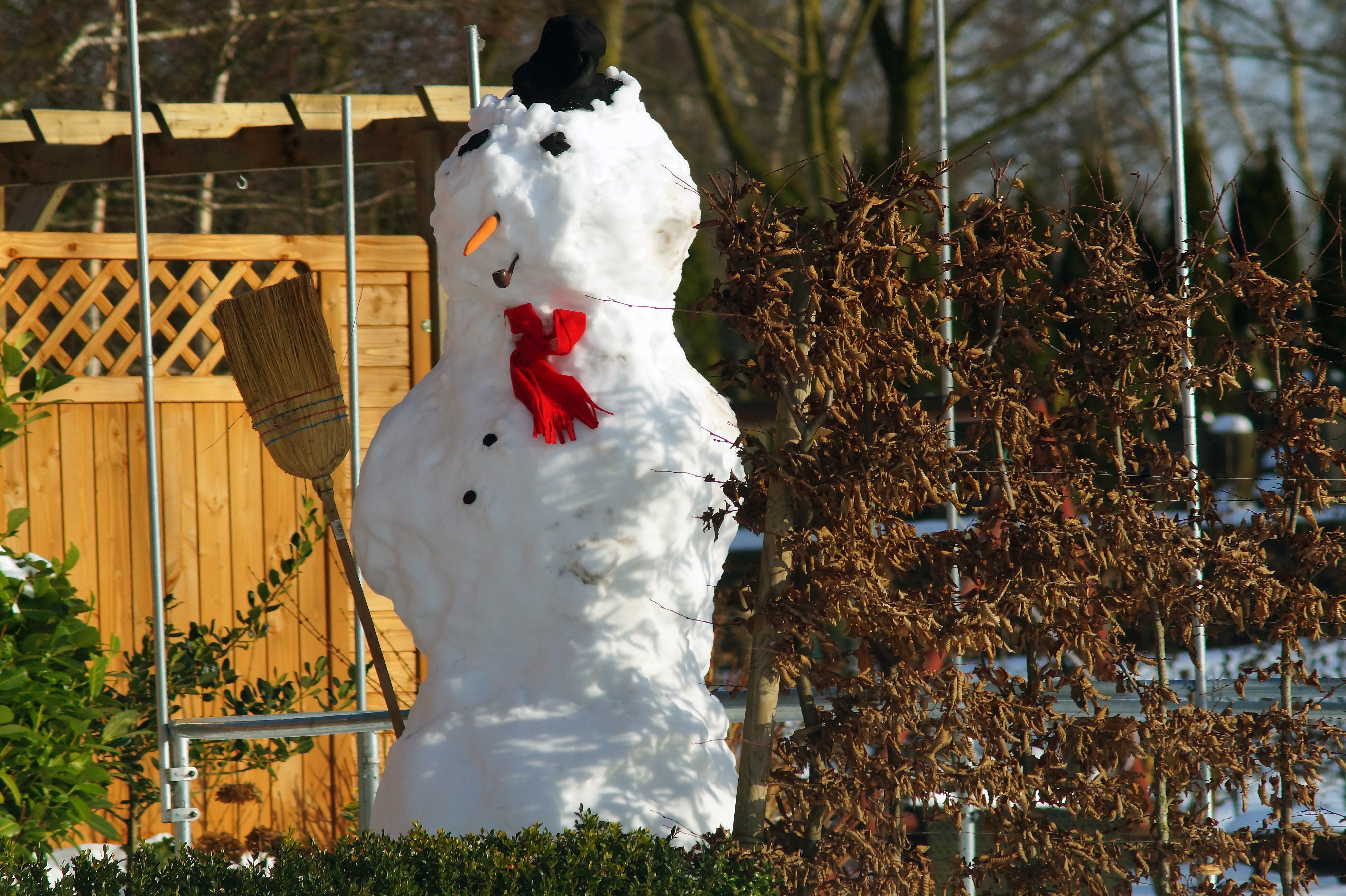 white snowman figure during daytime