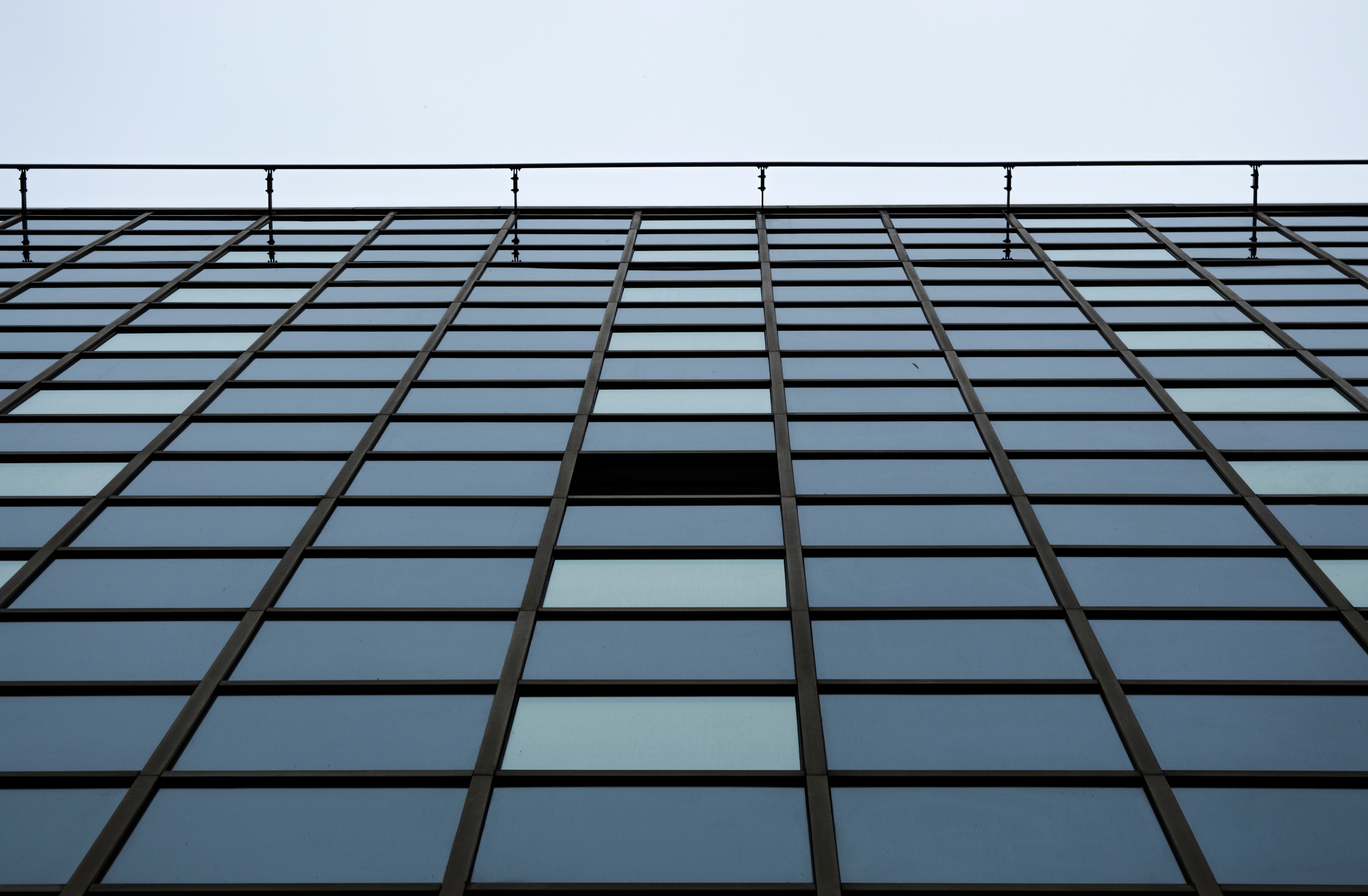 low angle photography of curtain wall high rise building