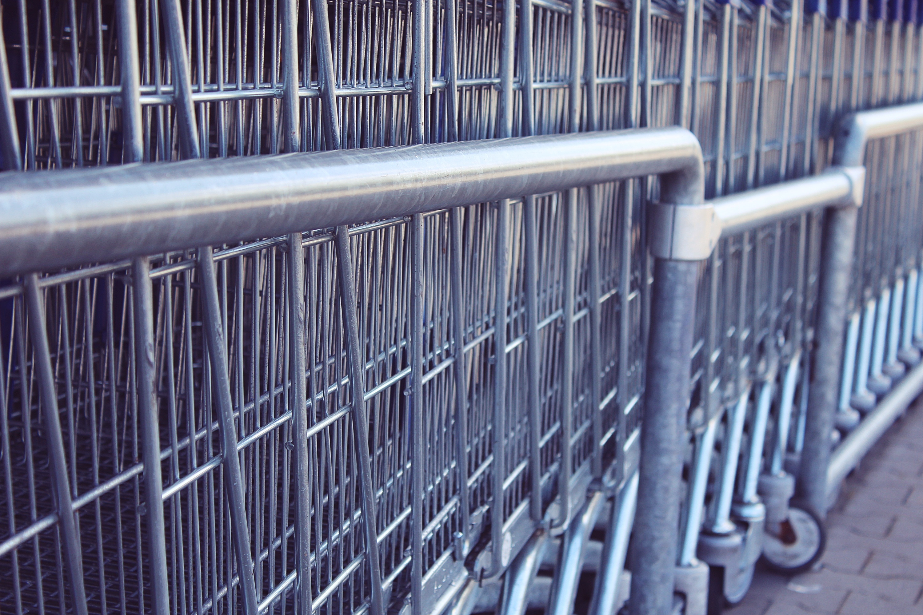 stack of gray shopping carts
