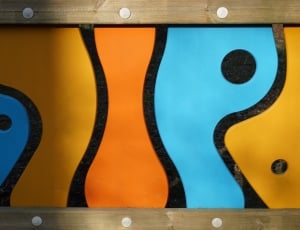 orange blue and yellow wooden decor thumbnail