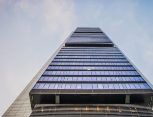 black and blue glass high rise building thumbnail