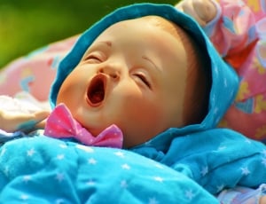 blonde haired plastic baby doll thumbnail