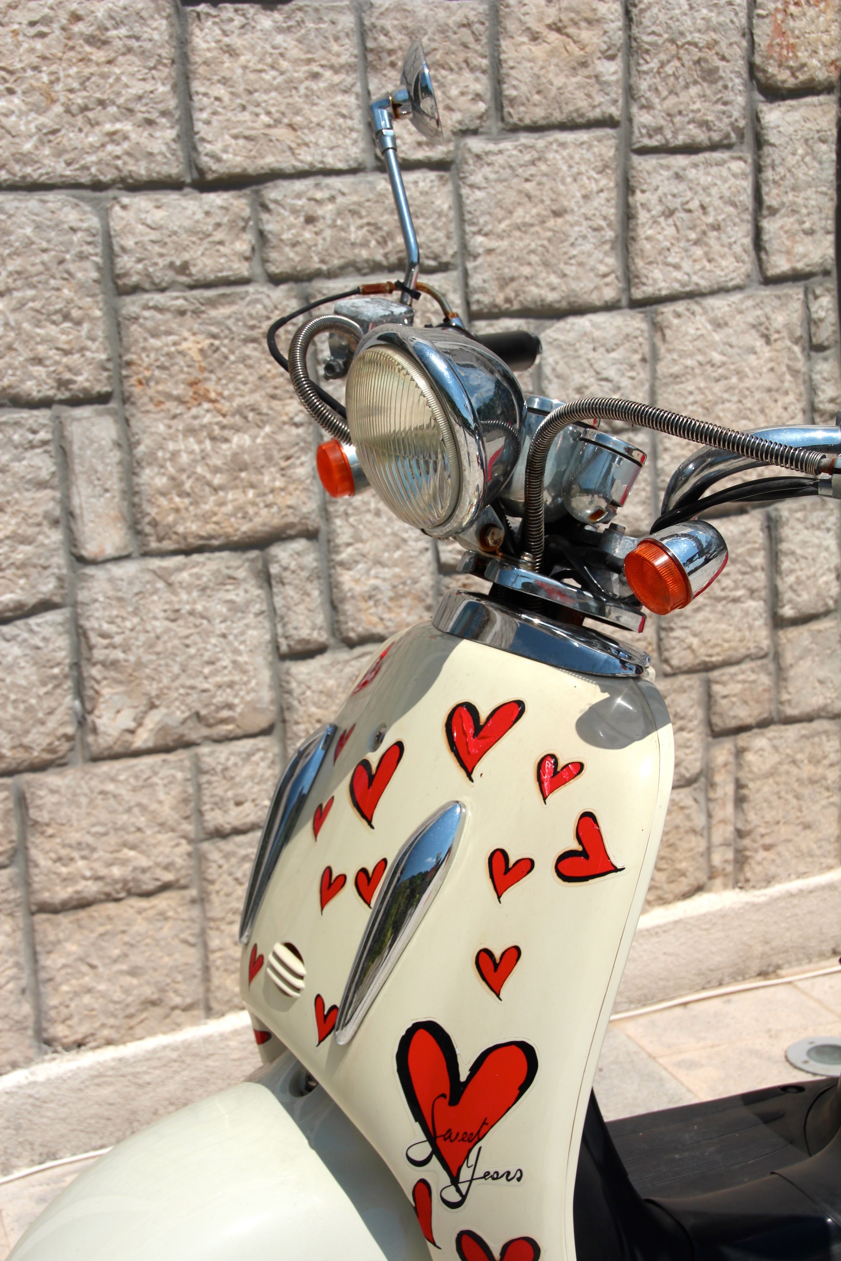 white and red heart floral motor scooter