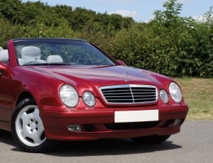 red mercedes benz convertible coupe thumbnail