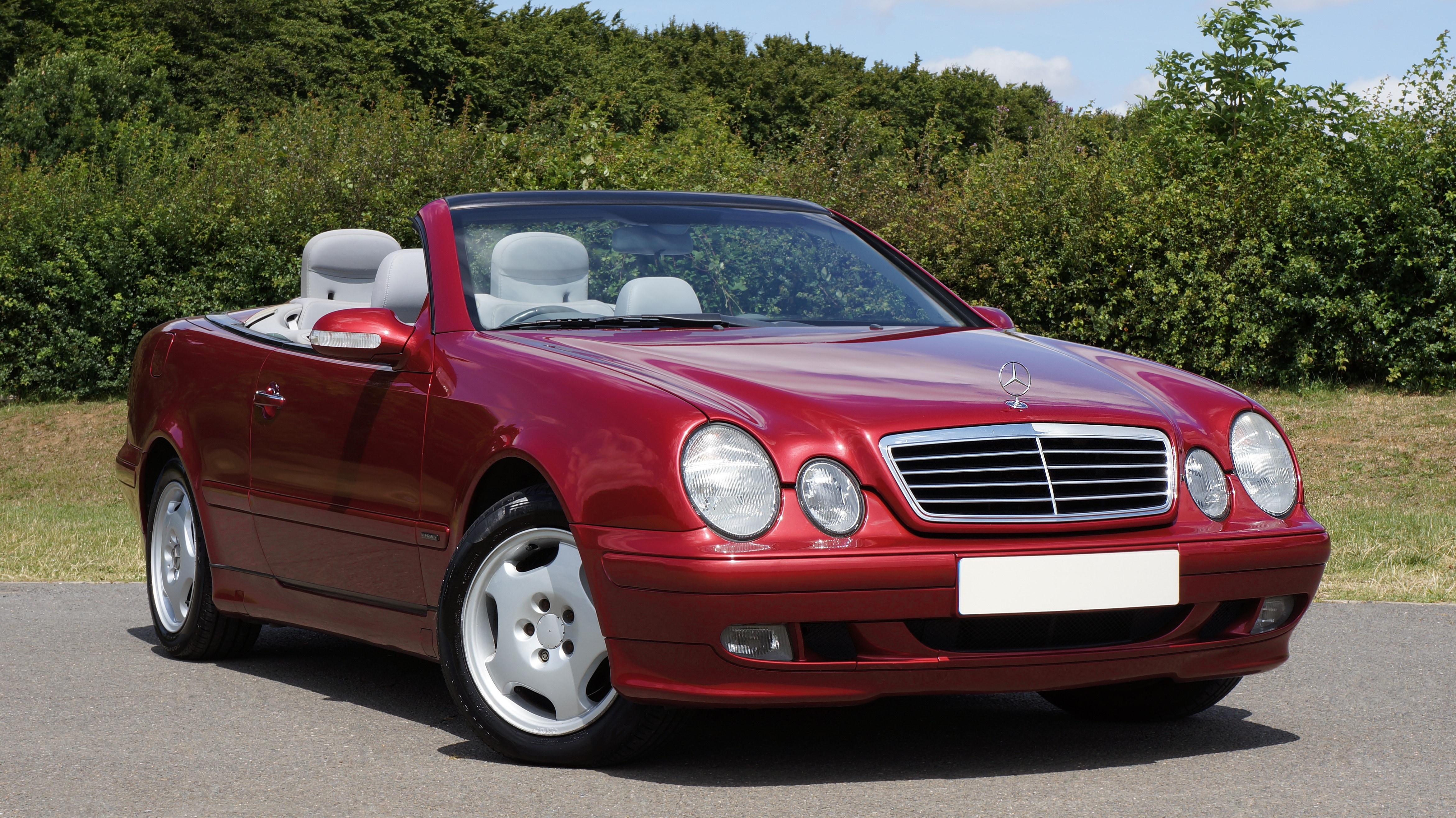 red mercedes benz convertible coupe