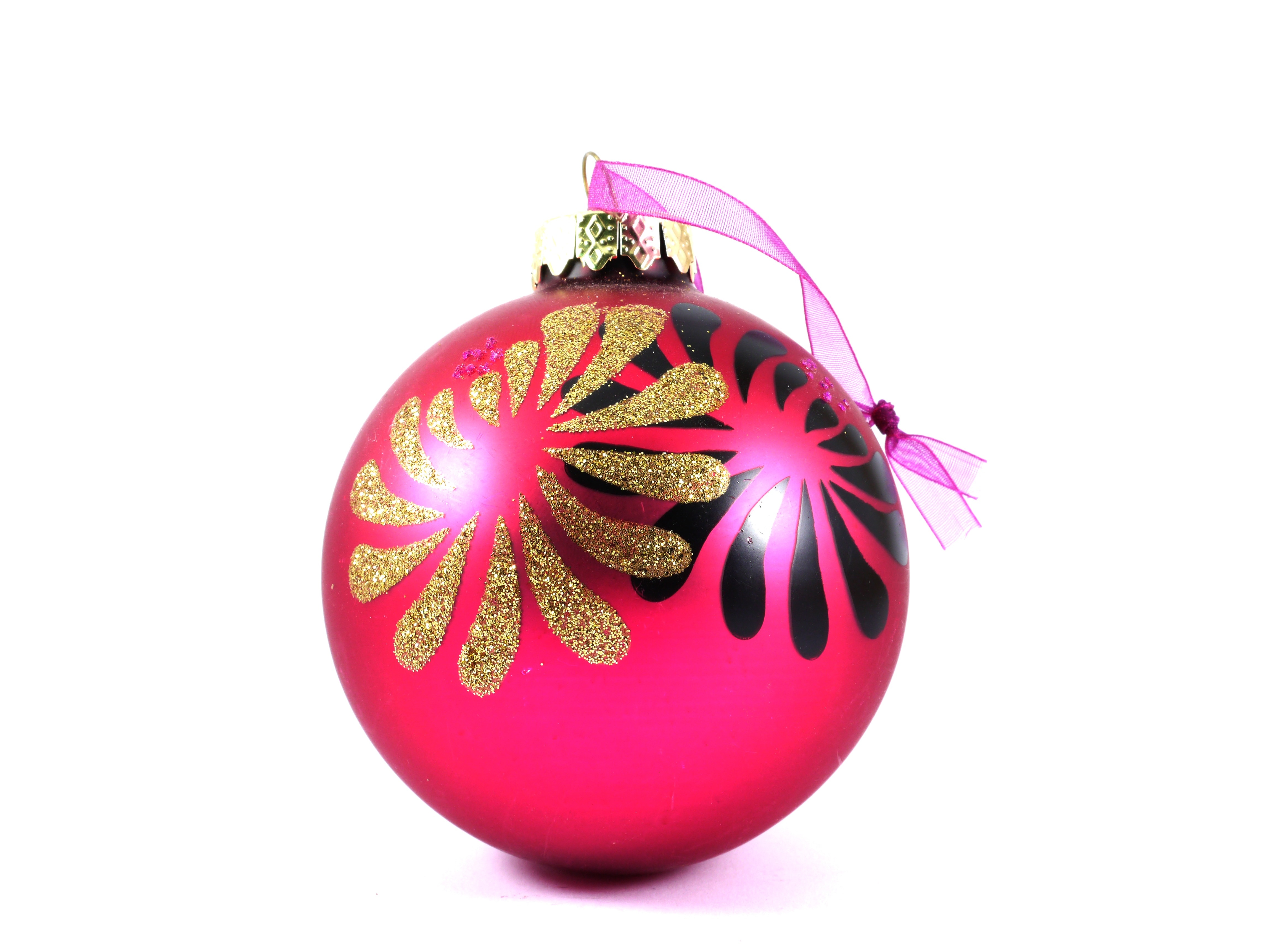 pink, gold, and black bauble