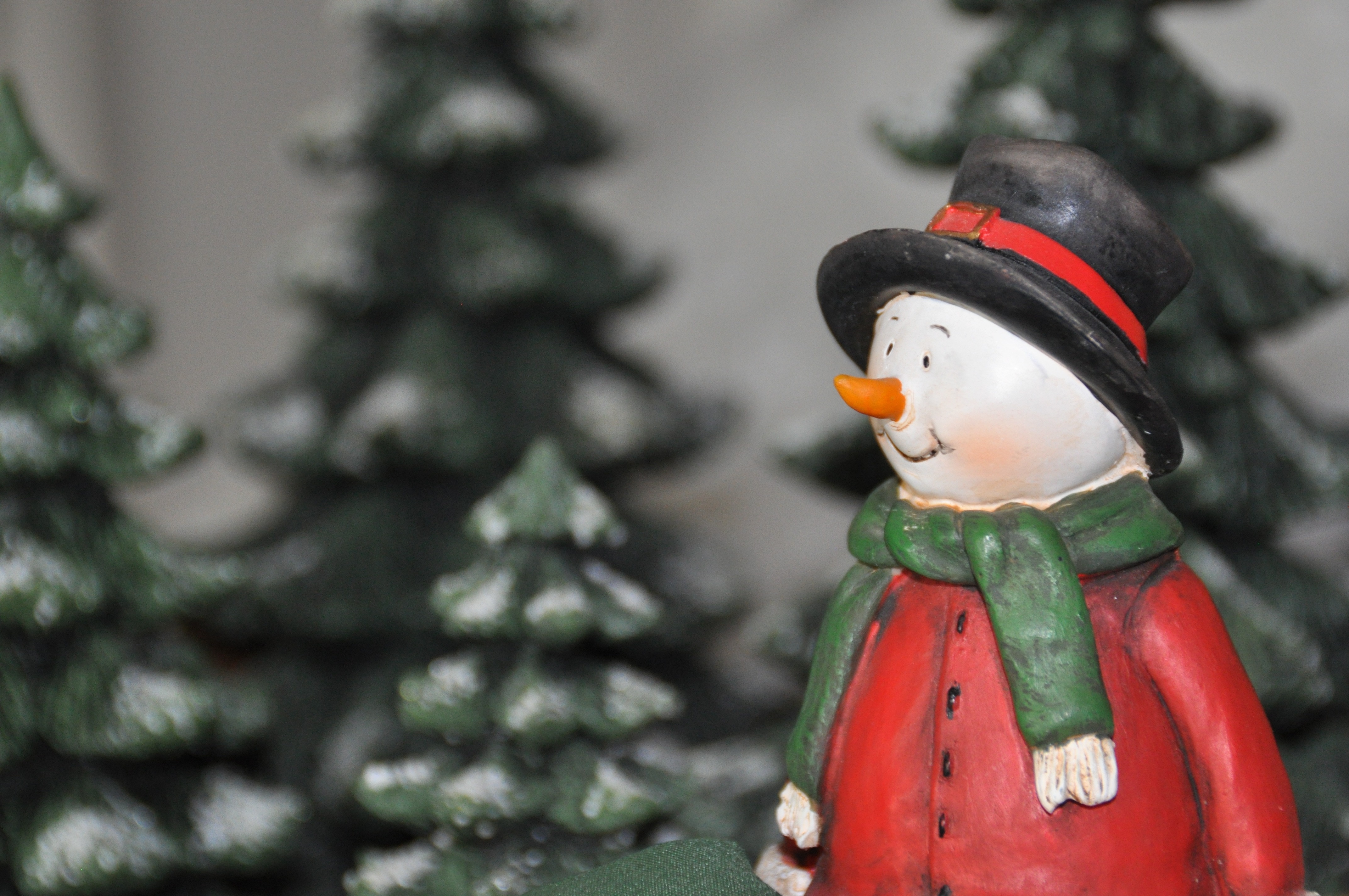 white and red snowman figurine