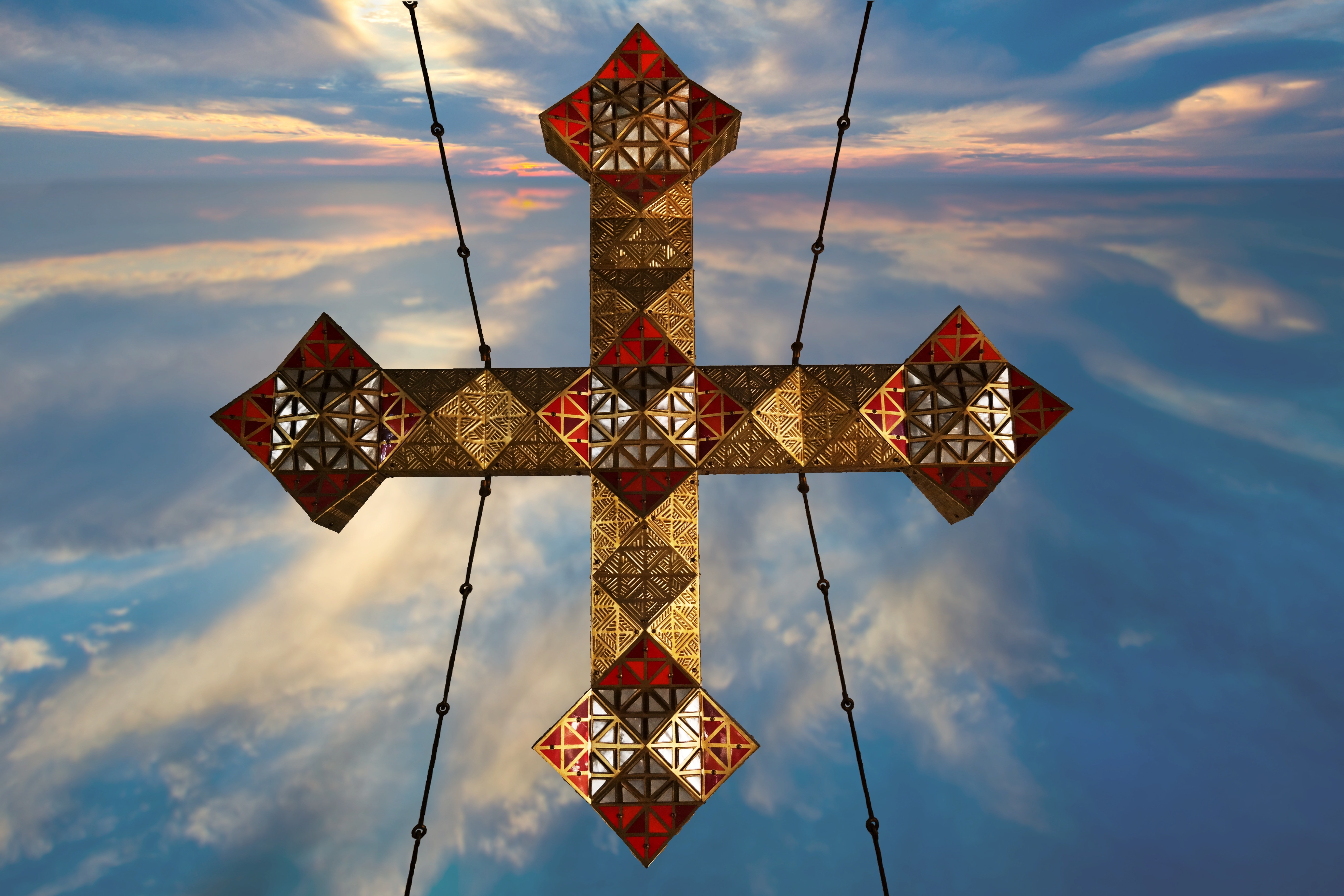red brown and beige cross