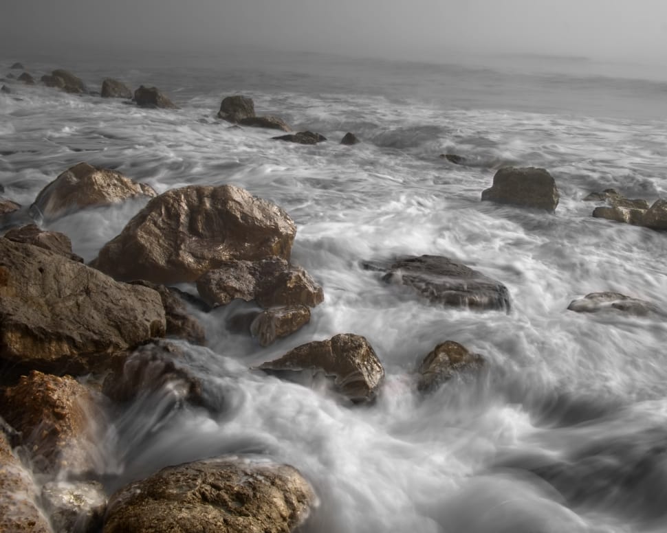 time lapse photography of sea wave and rocks preview