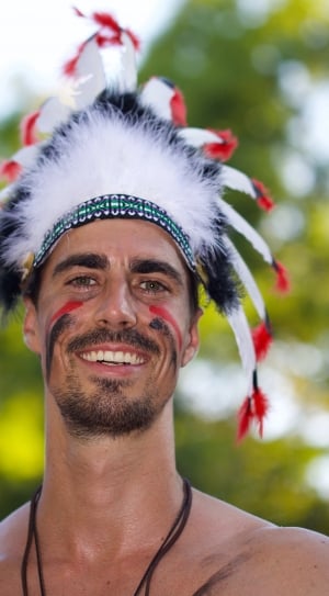 men's white red and black feather head dress thumbnail