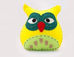 yellow owl sewed plush toy thumbnail