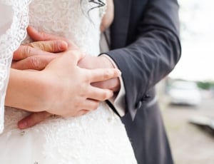 bride and groom holding hands thumbnail