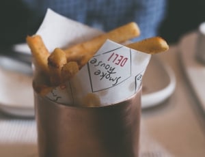 snoke house deli fries on white and black paper thumbnail