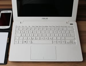 white Asus laptop turned off thumbnail