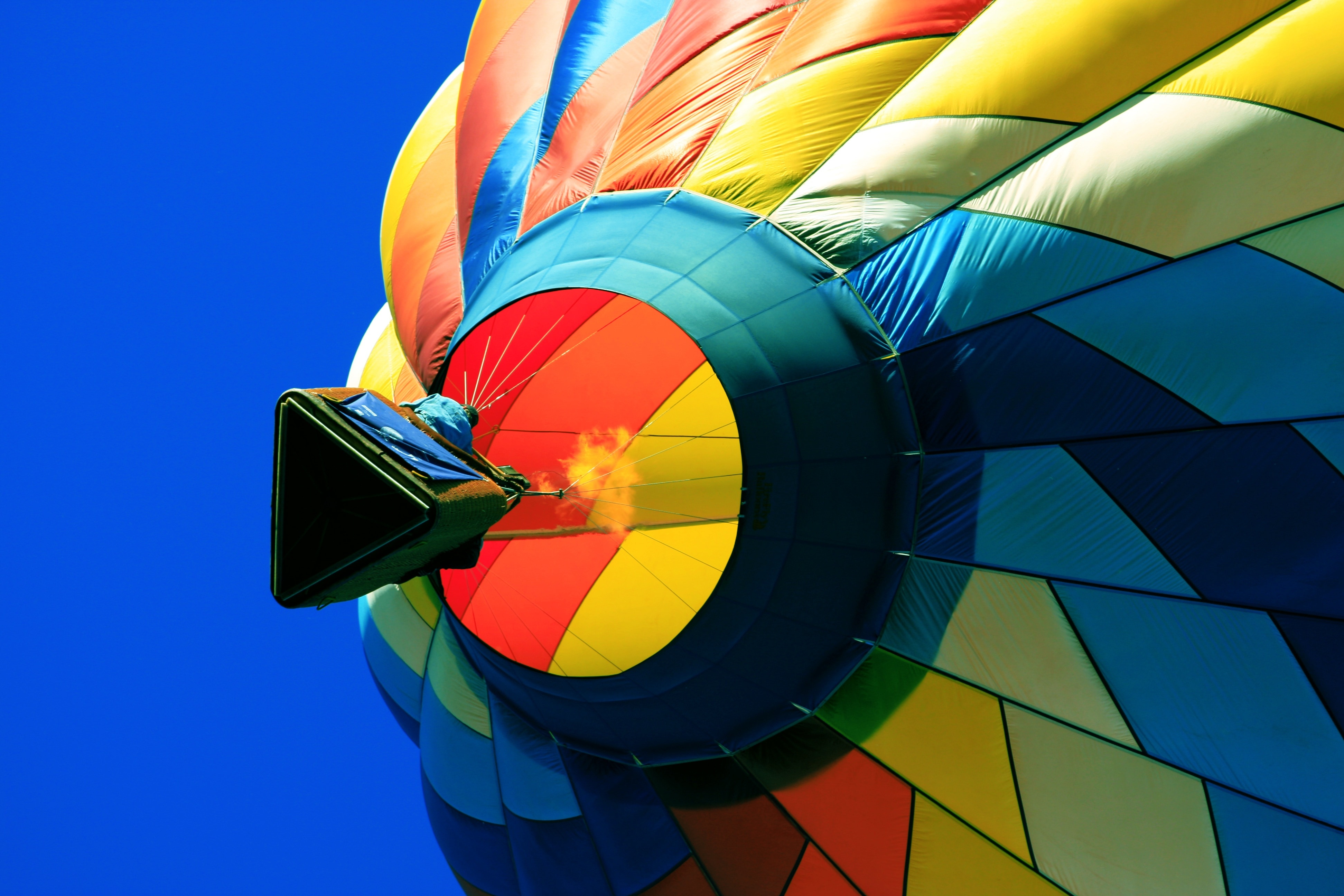 yellow blue and red multicolored hot air balloon
