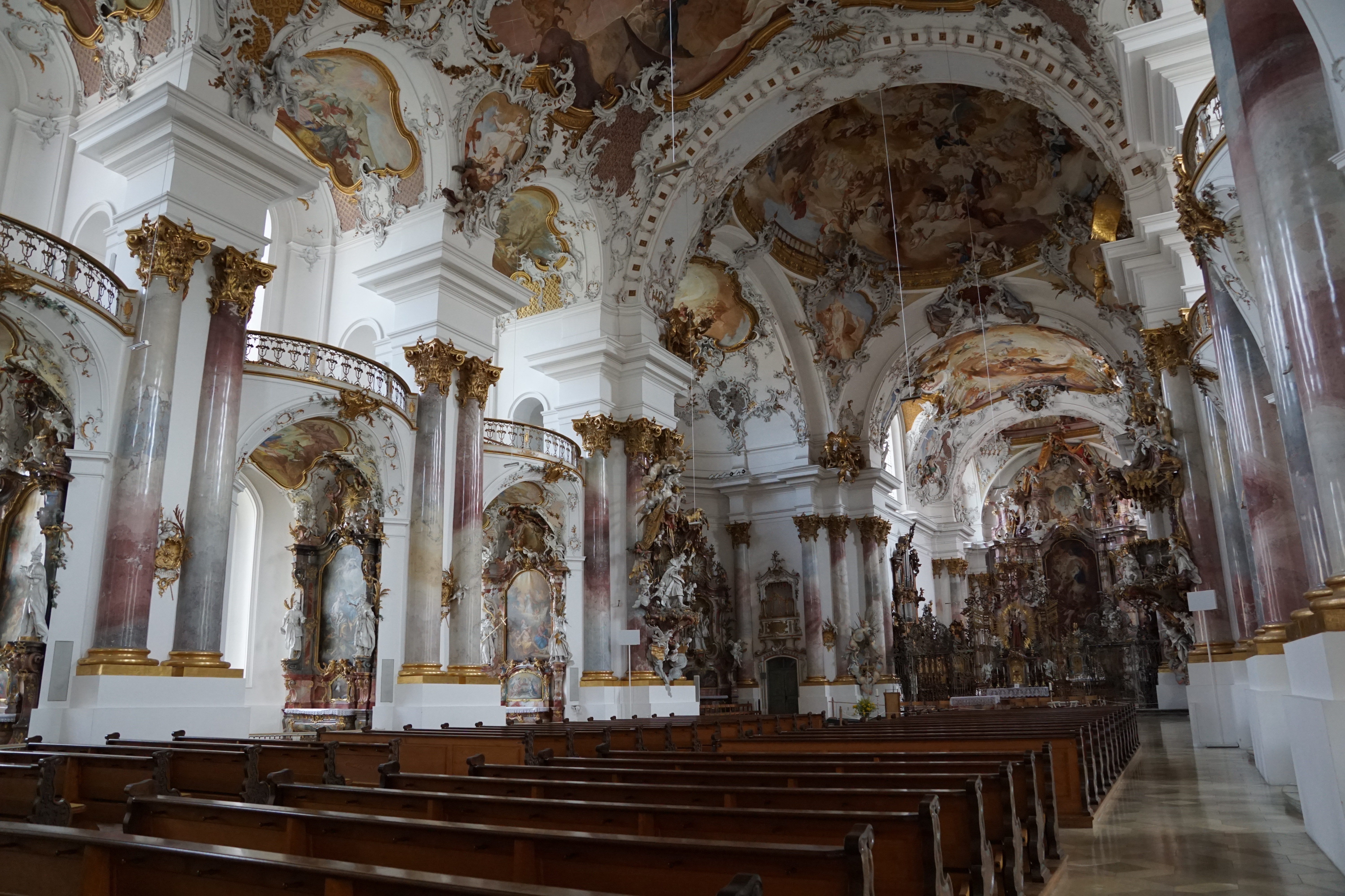 white and brown painted cathedral interior