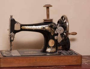 black and stainless steel singer sewing machine thumbnail