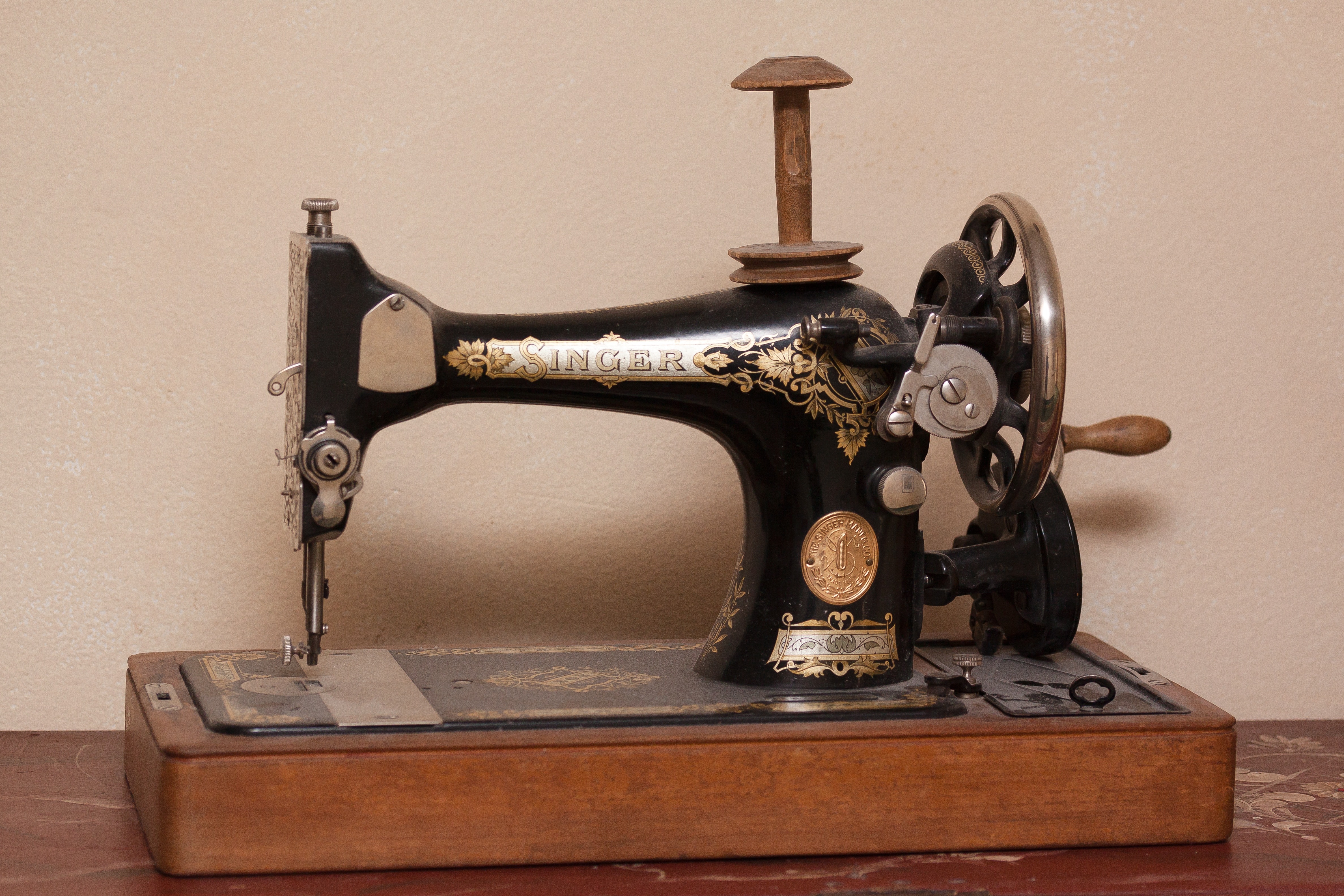 black and stainless steel singer sewing machine