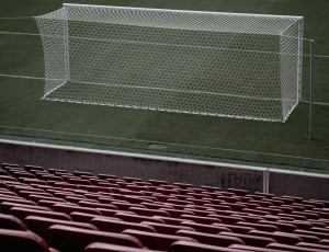 white soccer goal seen from audience seats thumbnail