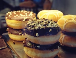 brown and black doughnuts thumbnail