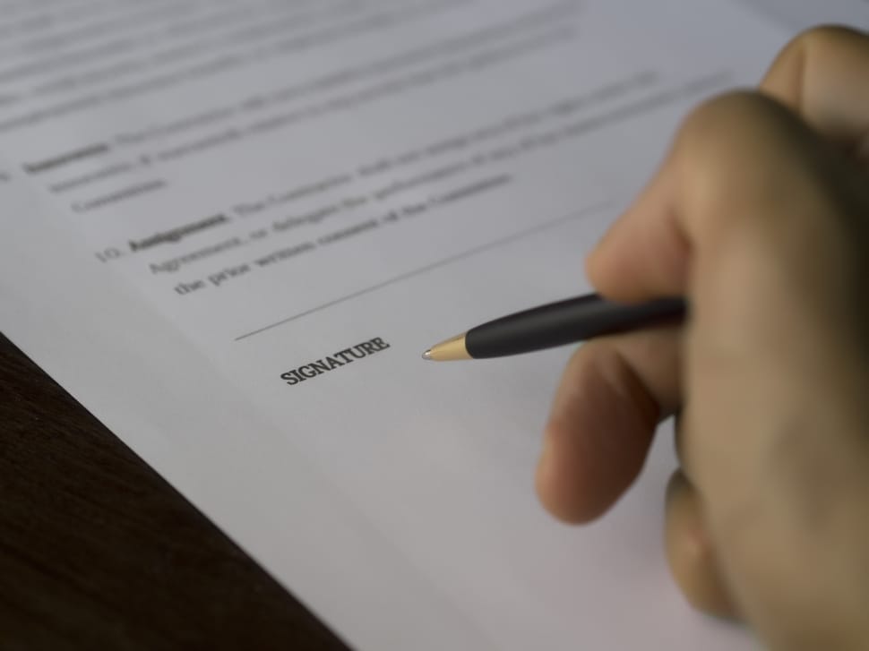 person signing a document preview