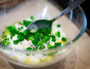 salt and pepper with onion chives  on clear glass bowl thumbnail