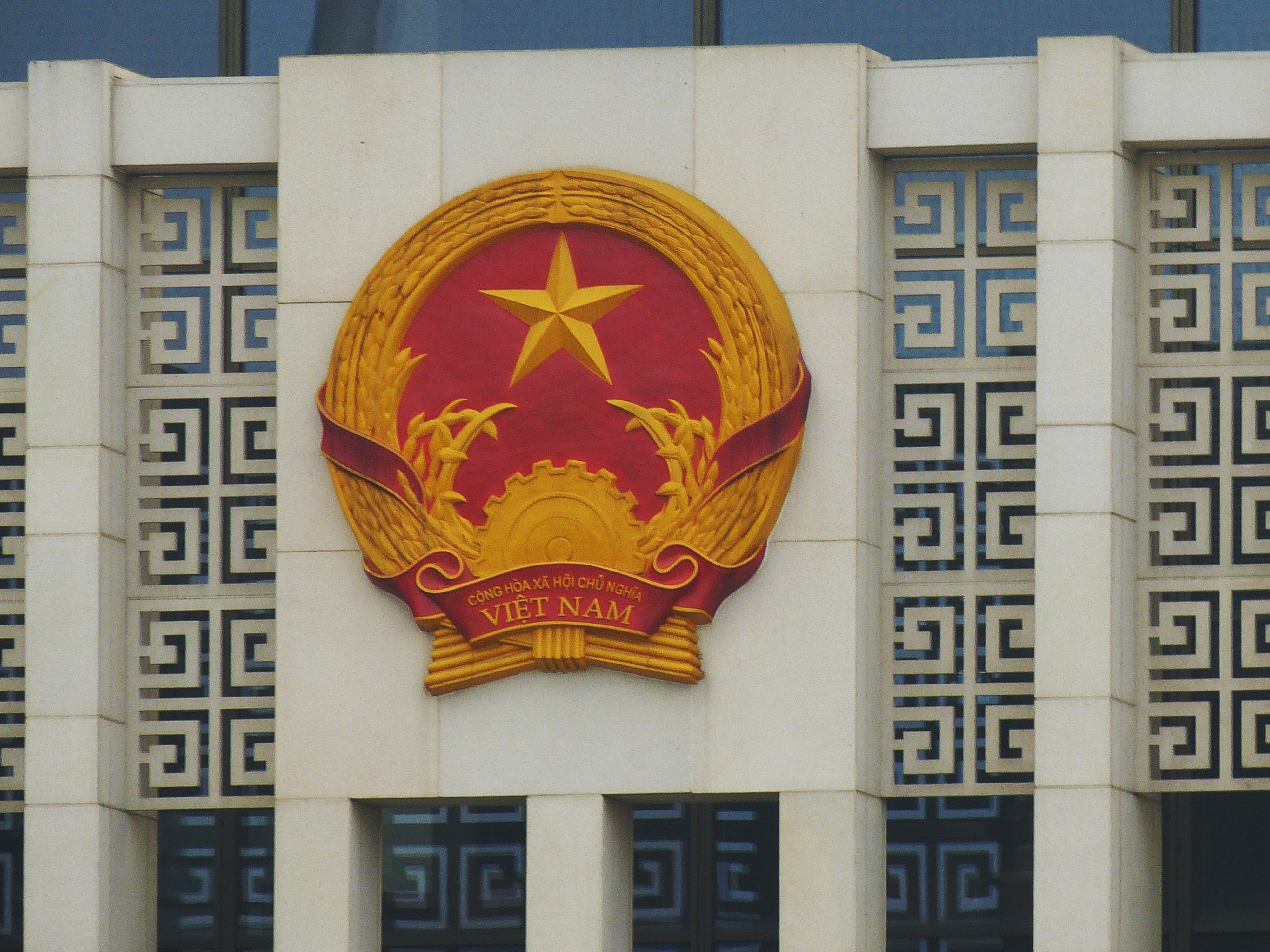brown and red vietnam logo