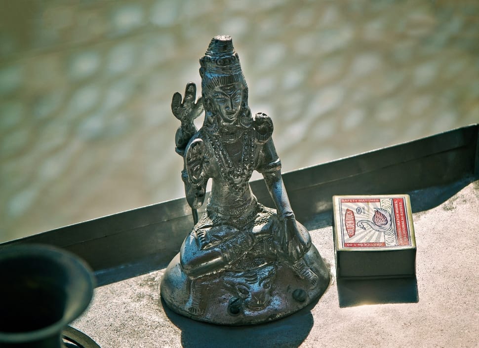 silver buddha statuette preview