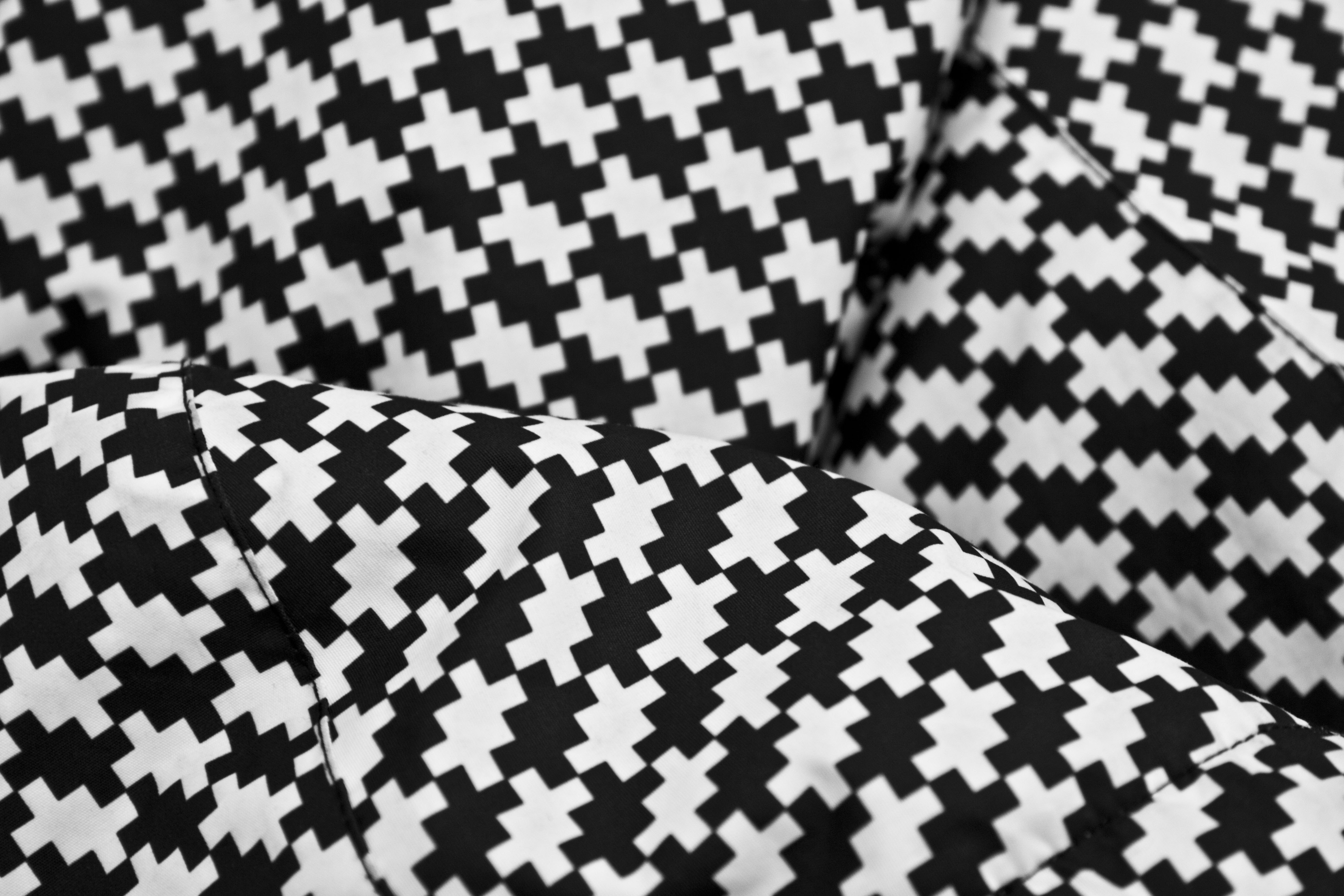 black and white cross print textile