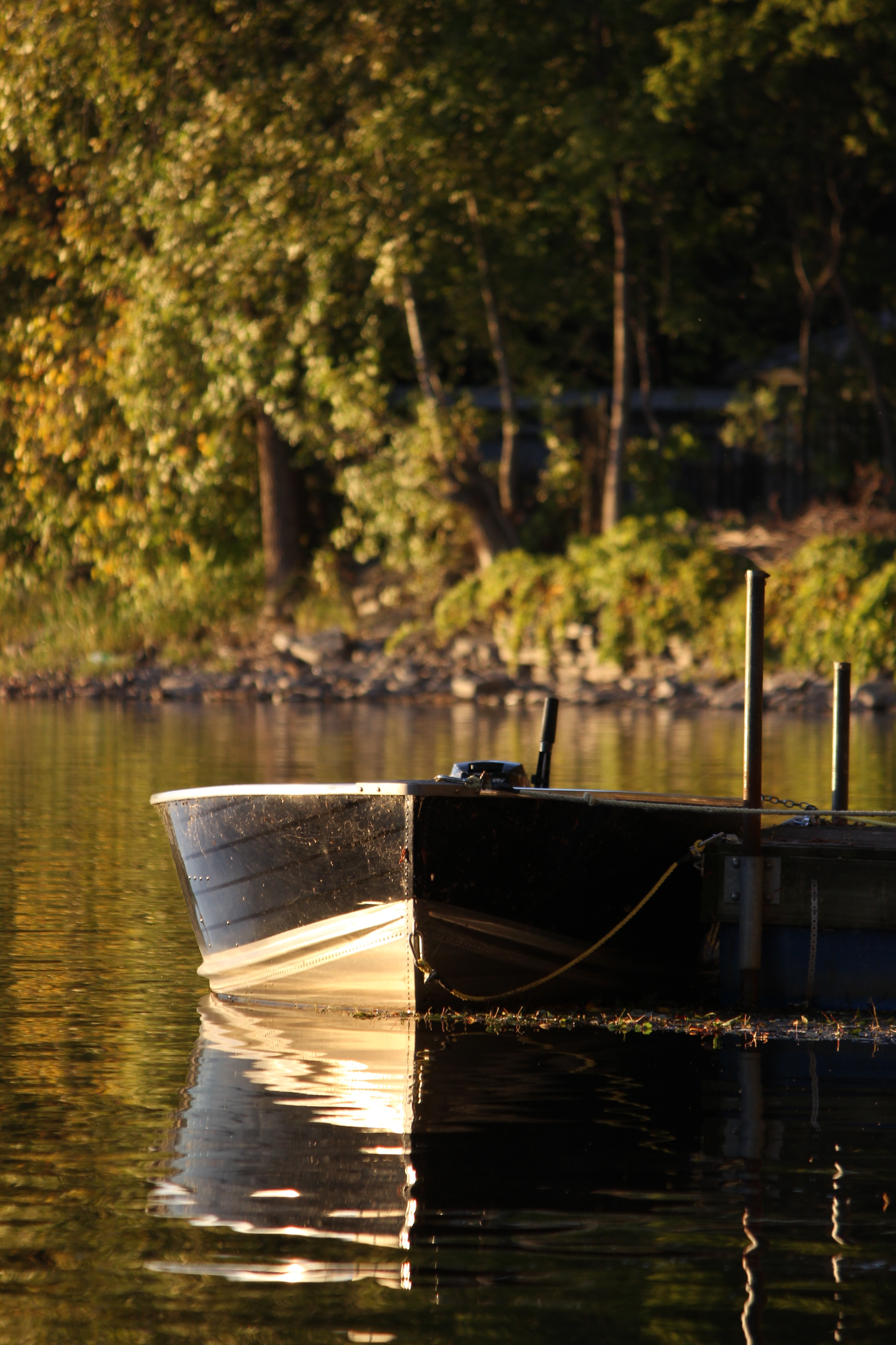 black wooden rowboat