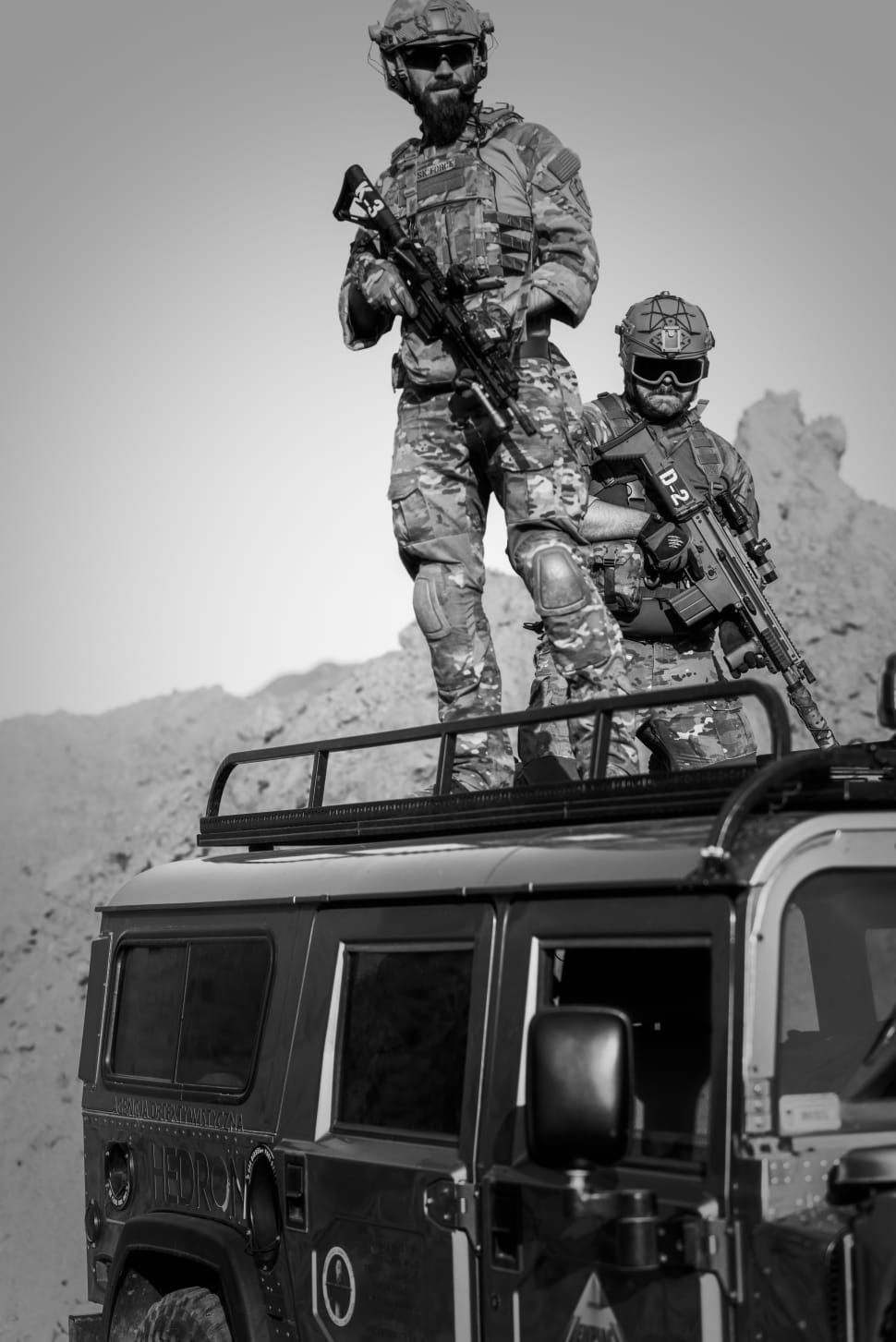 grayscale photography of 2 soldiers preview