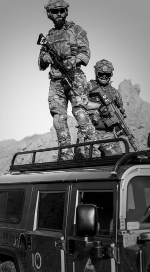grayscale photography of 2 soldiers thumbnail