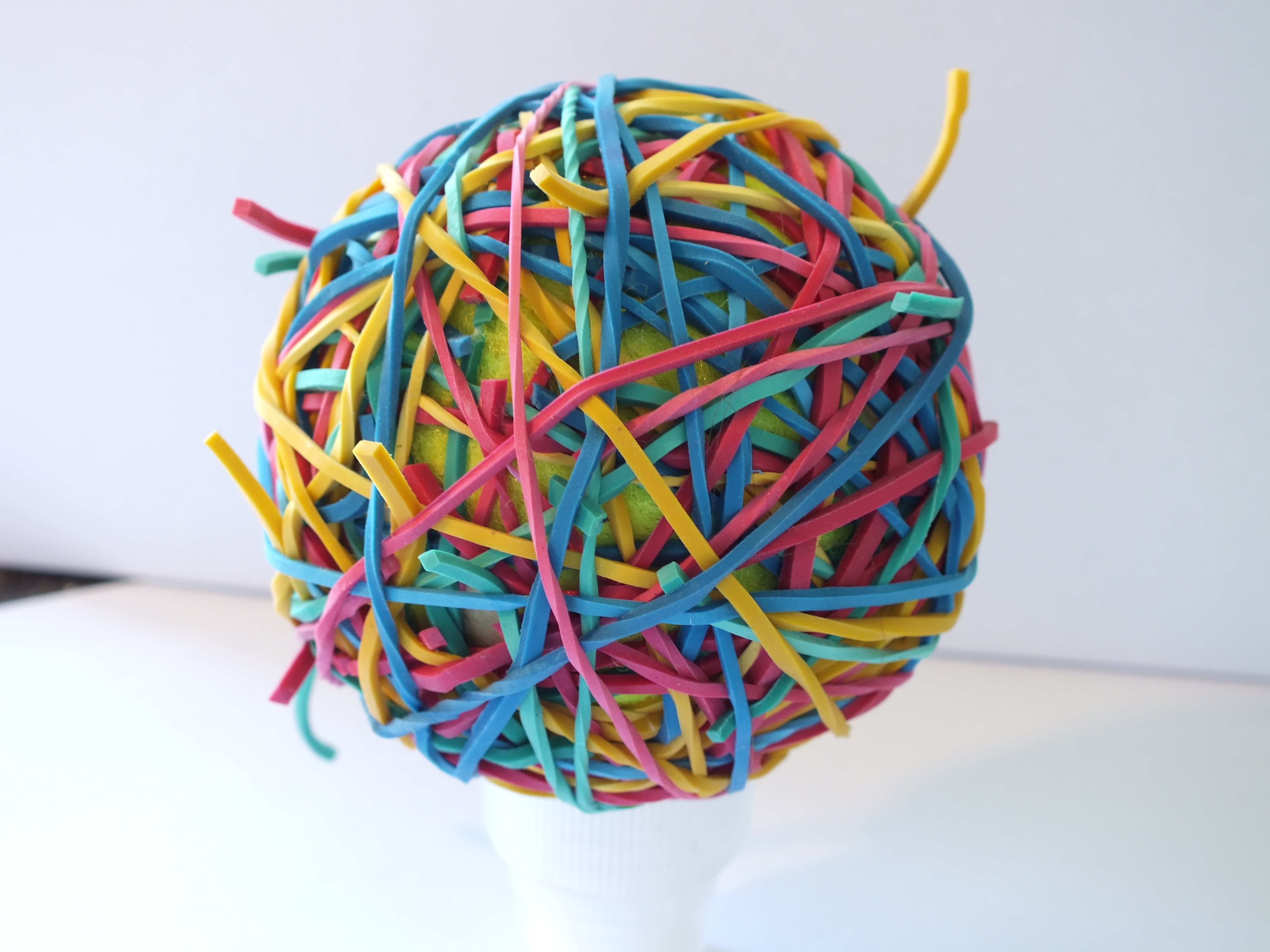 multicolored rubber band ball