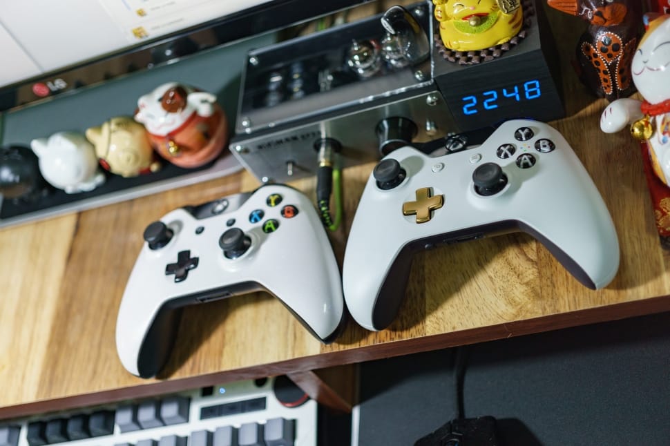 two xbox one wireless controller on table preview