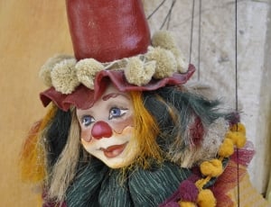 red yellow clown doll thumbnail