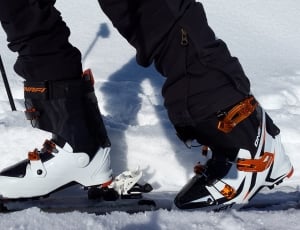 white and black orange snowboard thumbnail