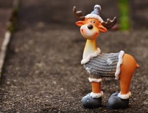 brown orange and black reindeer toy thumbnail