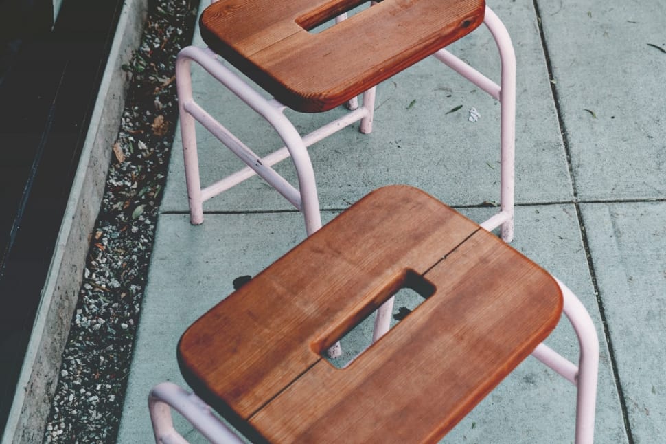 2 brown and pink wooden stools preview