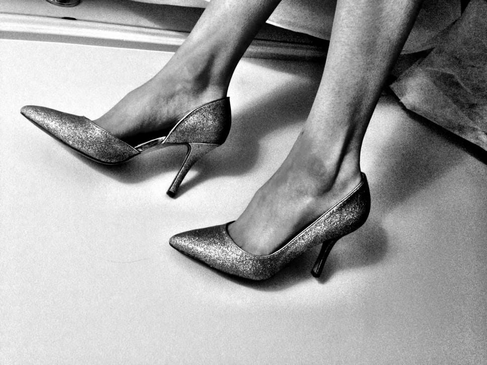 grayscale photo of person in d'orsay platform heels preview