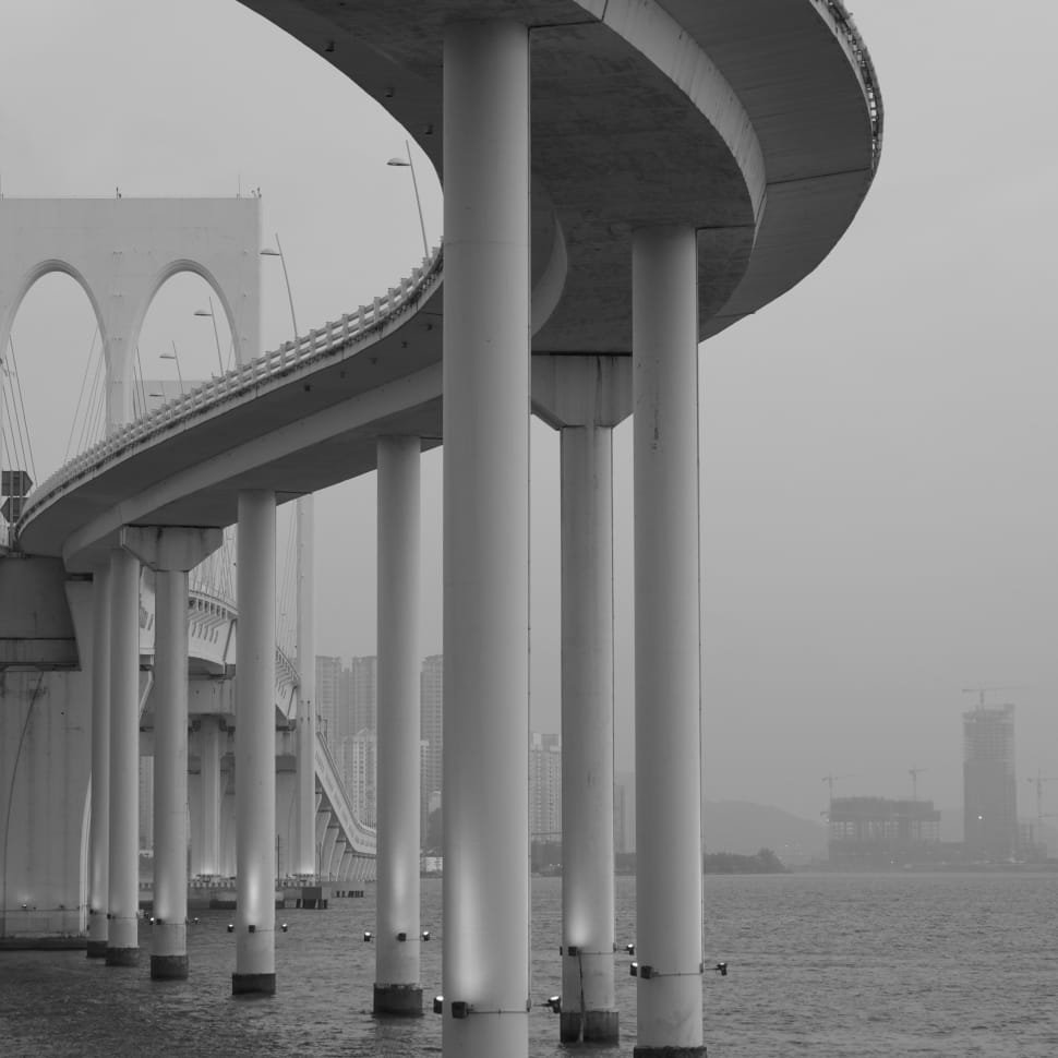 grayscale photo of concrete bridge preview