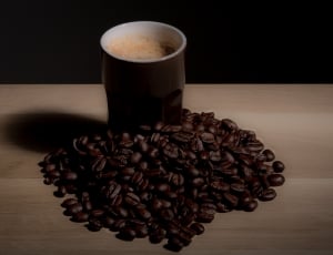 coffee bean and  brown ceramic mug thumbnail