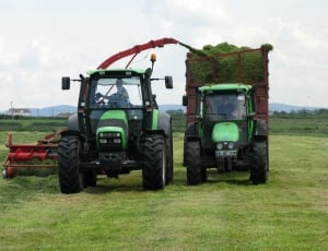 2 green and black compact tractor and farm truck thumbnail