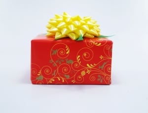 red floral gift box with yellow bow thumbnail