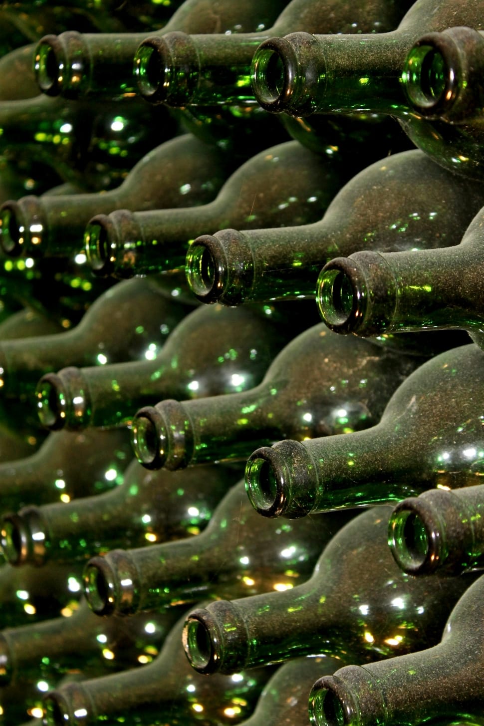 arrangement of green glass bottle lot in closeup photography preview