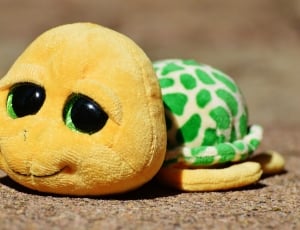 yellow green and white turtle plush toy thumbnail
