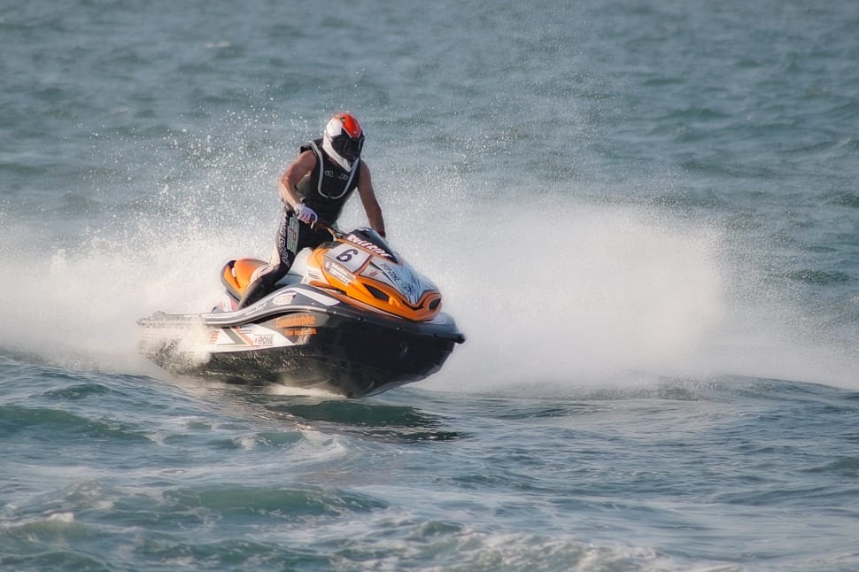 orange black and black personal watercraft preview