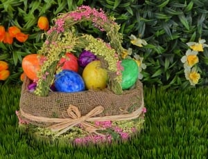 easter eggs in brown floral basket thumbnail